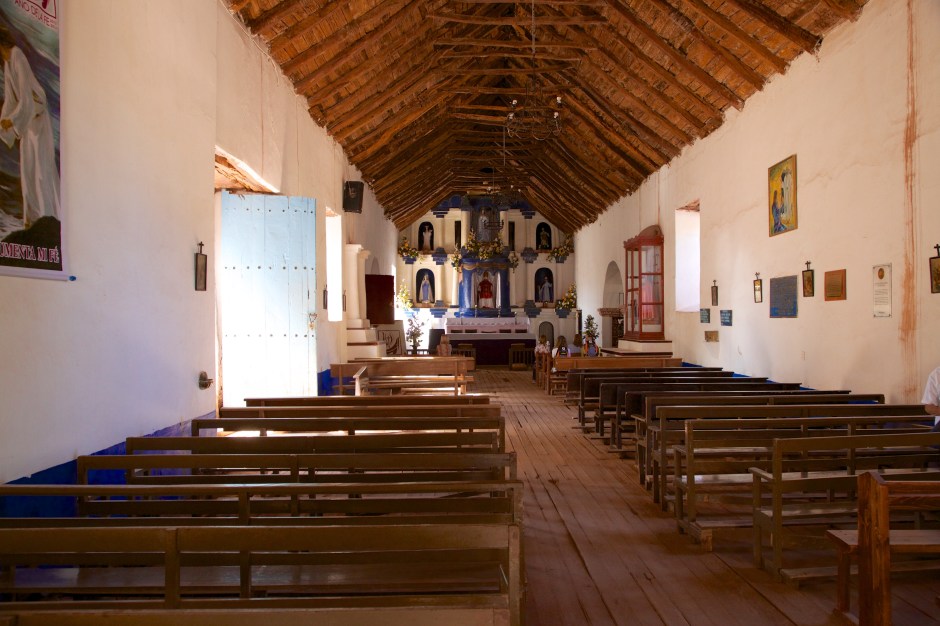 The nave of Iglesia San Pedro, with roof beams of cactus wood