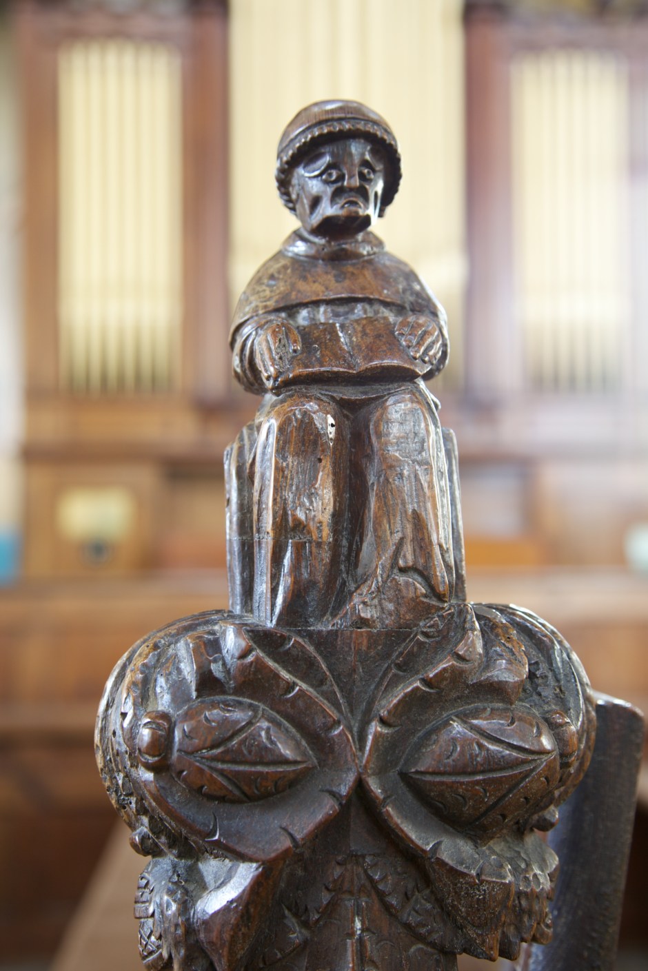 Medieval carving on the end of a pew