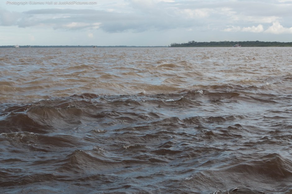 The two rivers have met, but not yet mixed. For several kilometres there remains a clearly visible distinction between water from the Rio Negro and water from the Rio Solimoes.