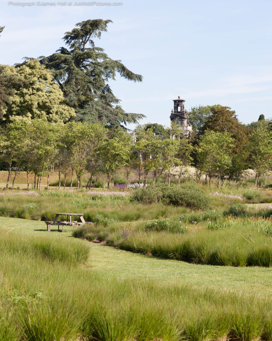 Informal gardens looking over towards the remaining wing of the original house